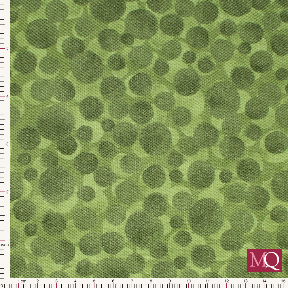 Cotton quilting fabric with painterly splotches in tonal mossy greens