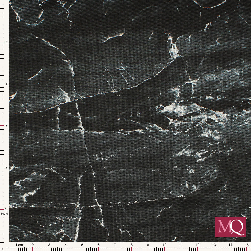 Cotton quilting fabric with print inspired by natural marble texture in black with white veining
