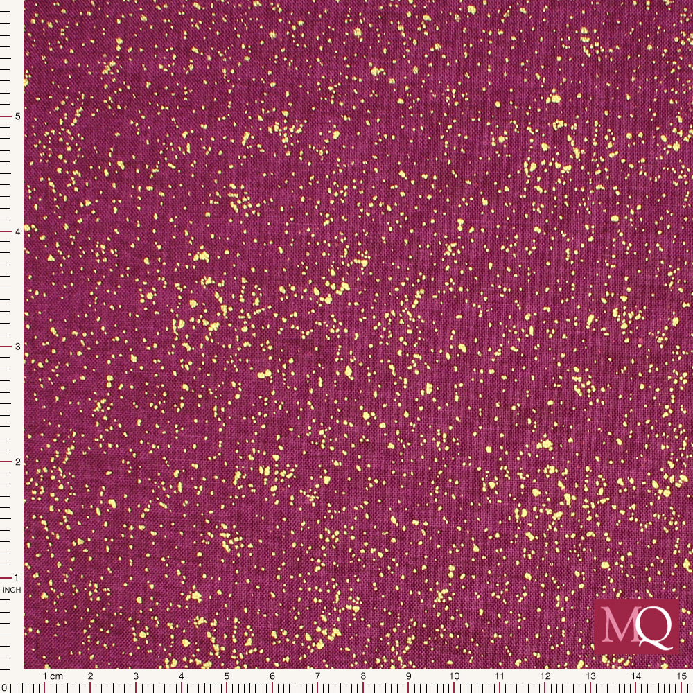 Cotton quilting fabric with purple background and gold flecked dots