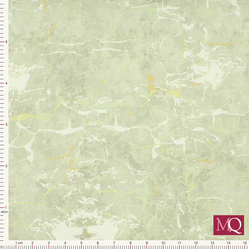 Cotton quilting fabric with subtle marbled texture in pale stoney green with white and yellow veining