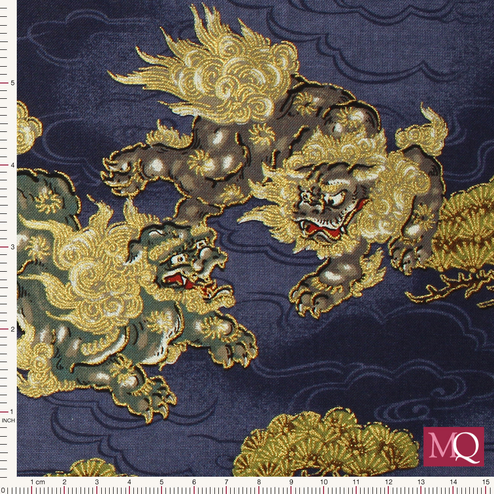 Cotton quilting fabric with Japanese dragon design and gold highlights on blue background