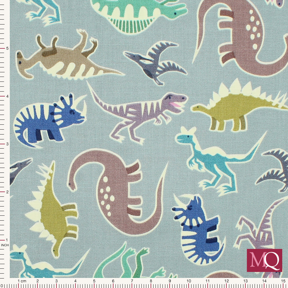 Cotton quilting fabric with multicoloured dinosaurs with glow in the dark outlines