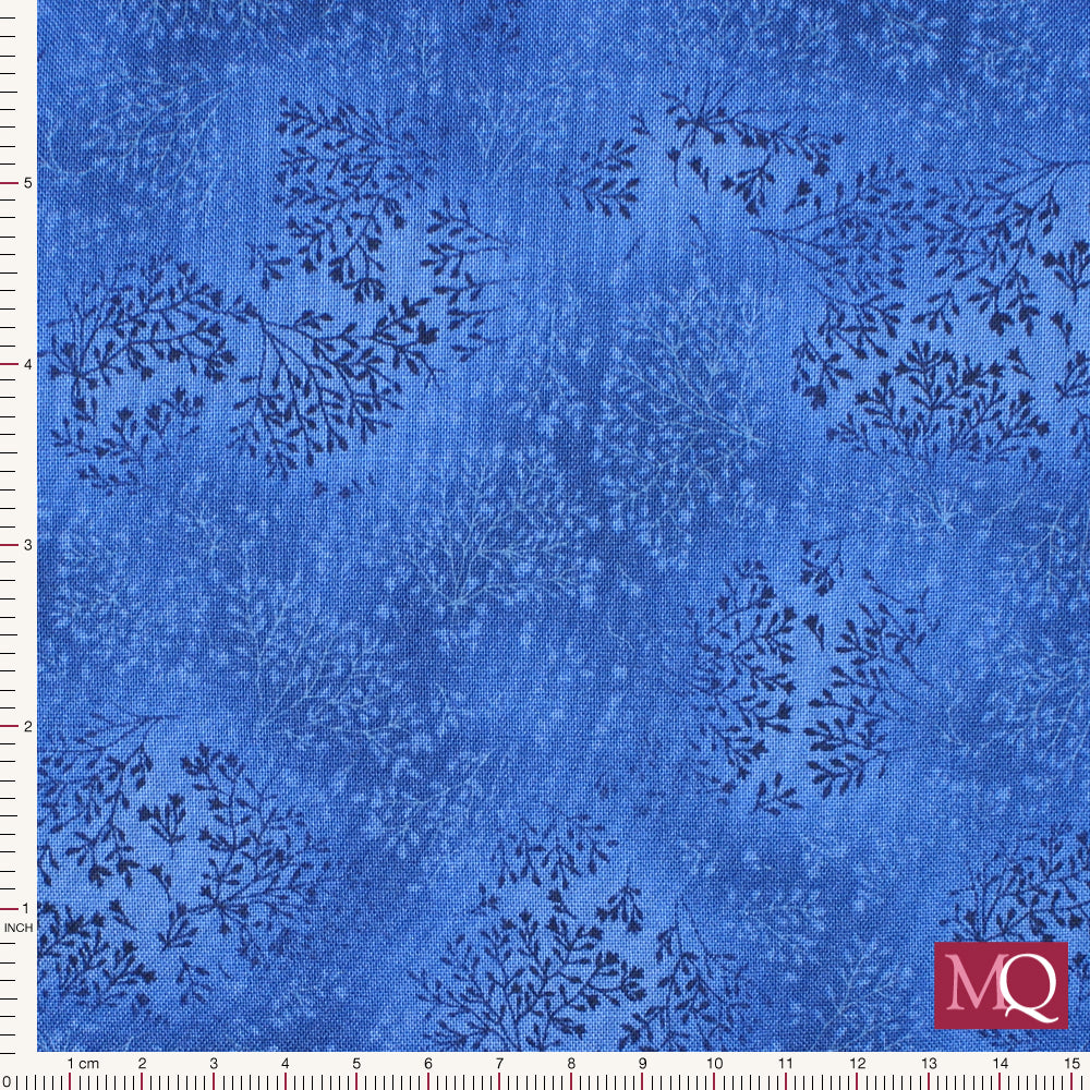 Cotton quilting fabric with tiny delicate branches on mottled royal blue background
