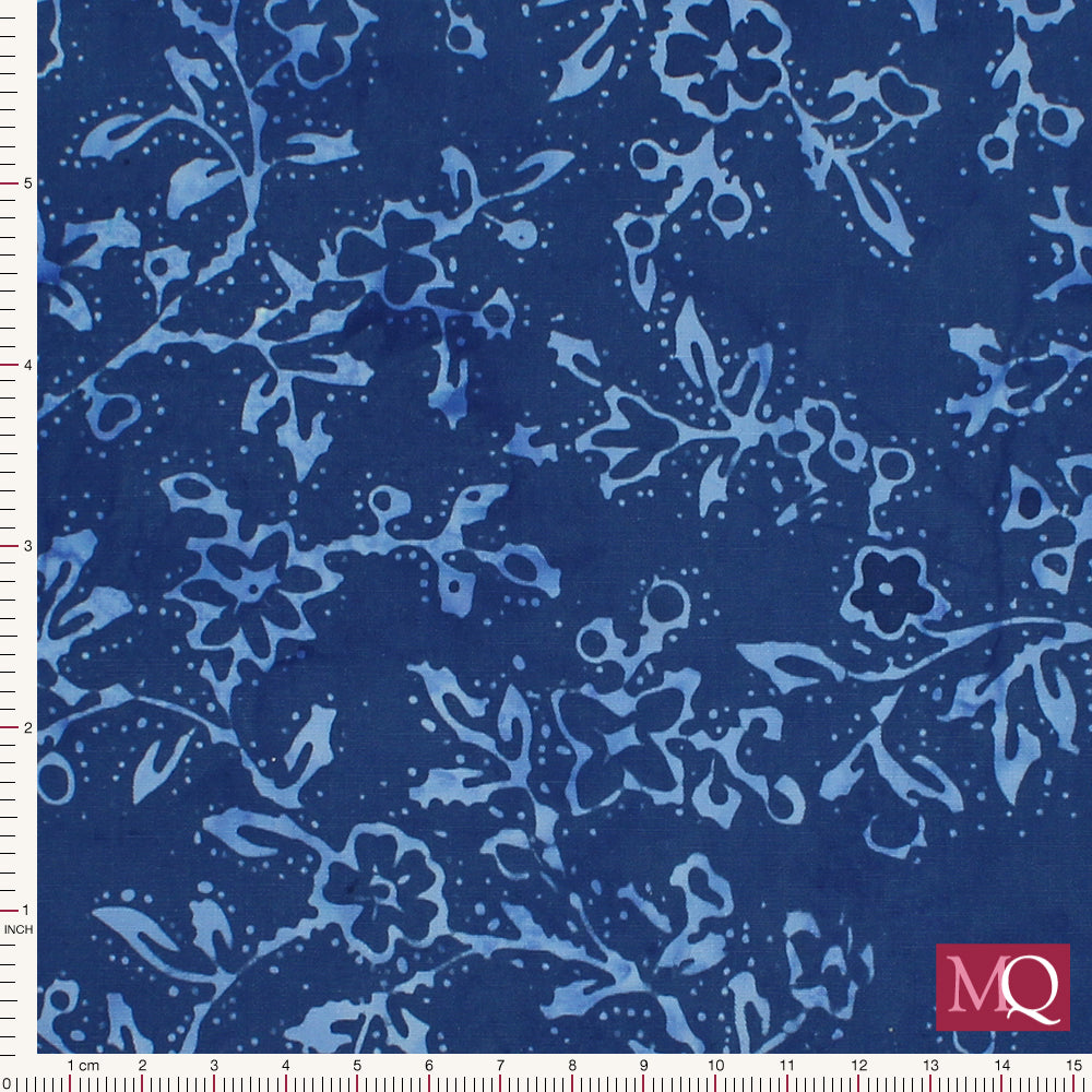 Cotton quilting fabric with tonal blue design featuring stems and flowers