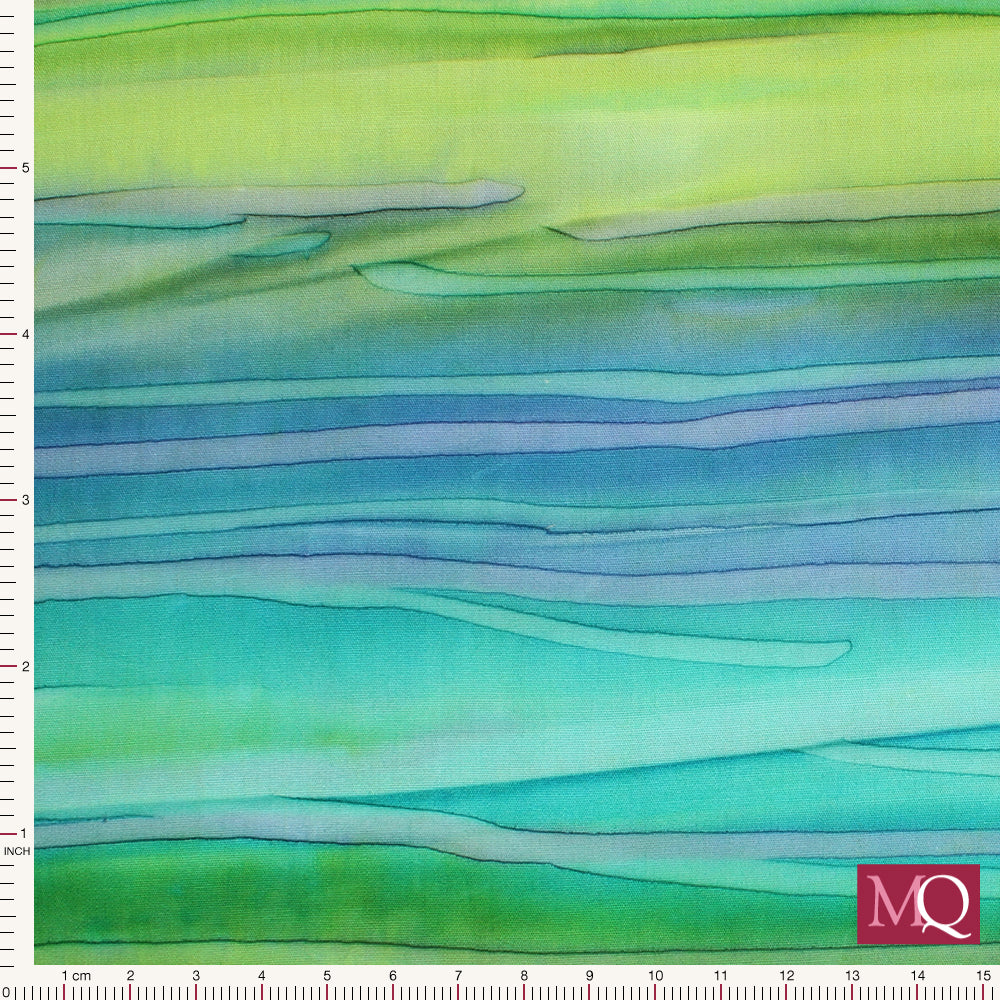 Cotton quilting with tie dye appearance in blue and green horizontal stripes