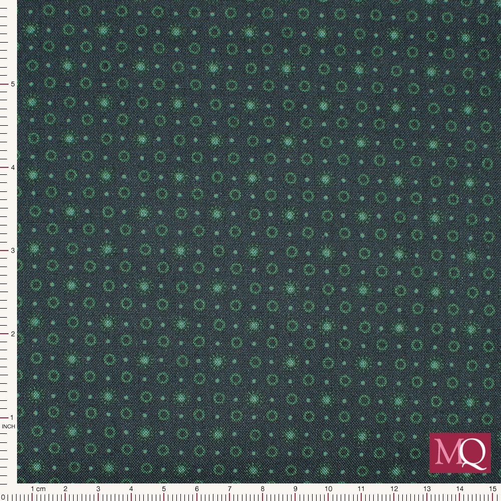 Cotton quilting fabric with teal dots and spots on a sea-green background