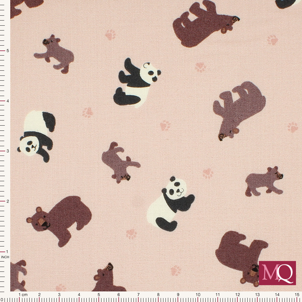 Cotton quilting fabric with smiling pandas and bears on soft pink background