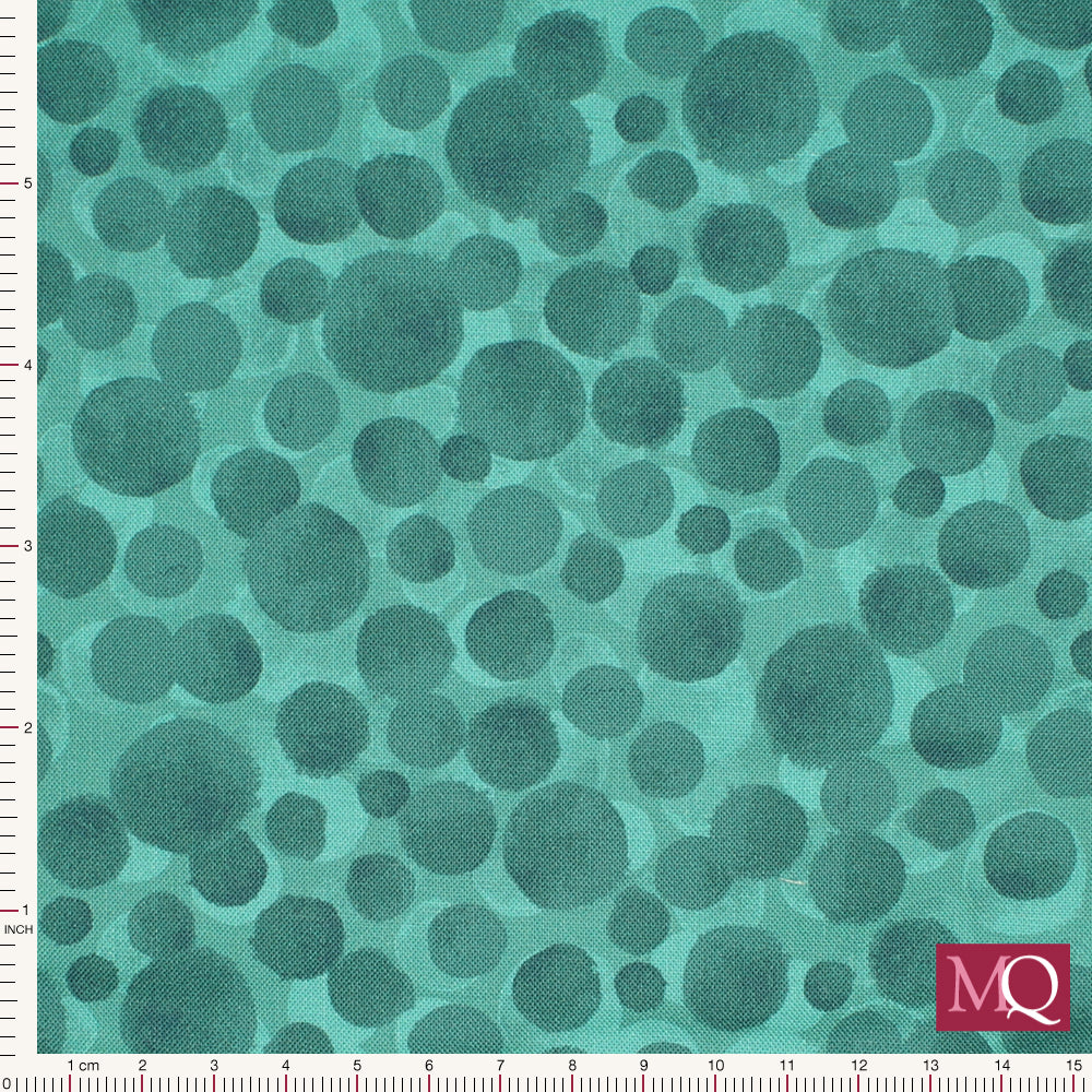 Cotton quilting fabric with painterly splotches in tonal turquoise