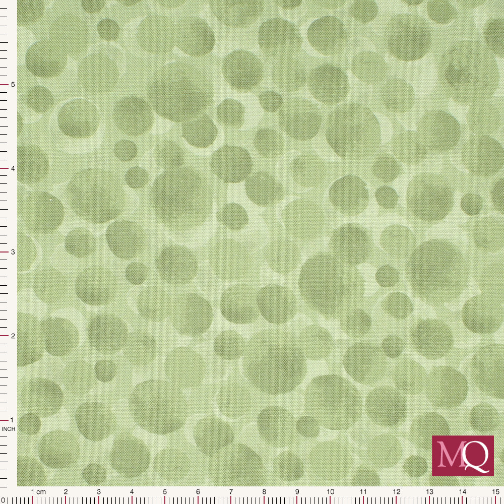 Cotton quilting fabric with painterly splotches in tonal sage greens