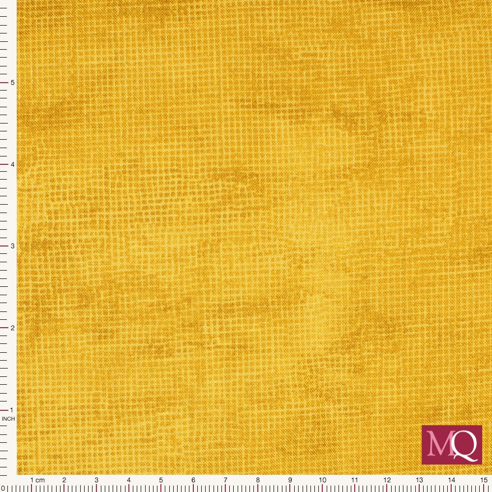 Cotton quilting fabric with printed mottled cross hatched texture in tonal mustard yellows