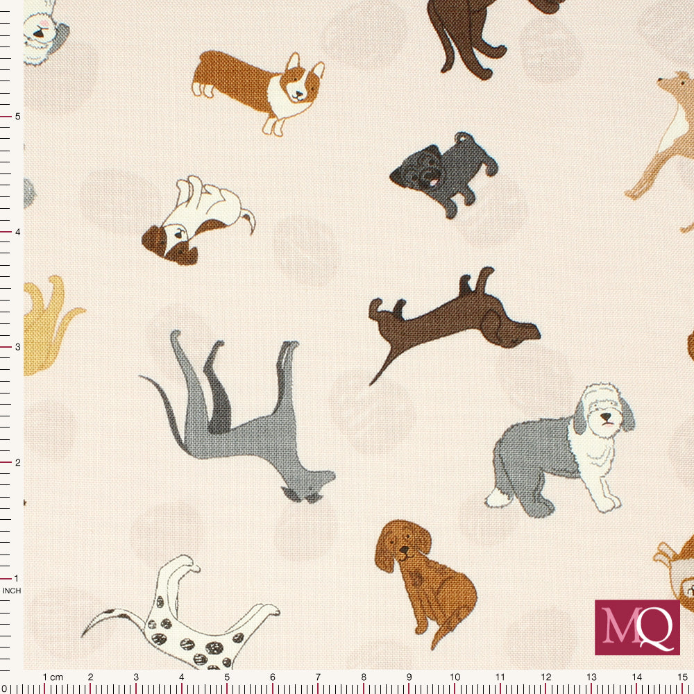 Cotton quilting fabric with novelty dog design on pale pink background with tonal polka dots