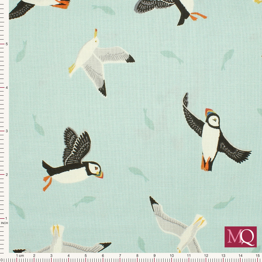 Cotton quilting fabric with seagulls and puffins in moden illustrative style on duck egg background