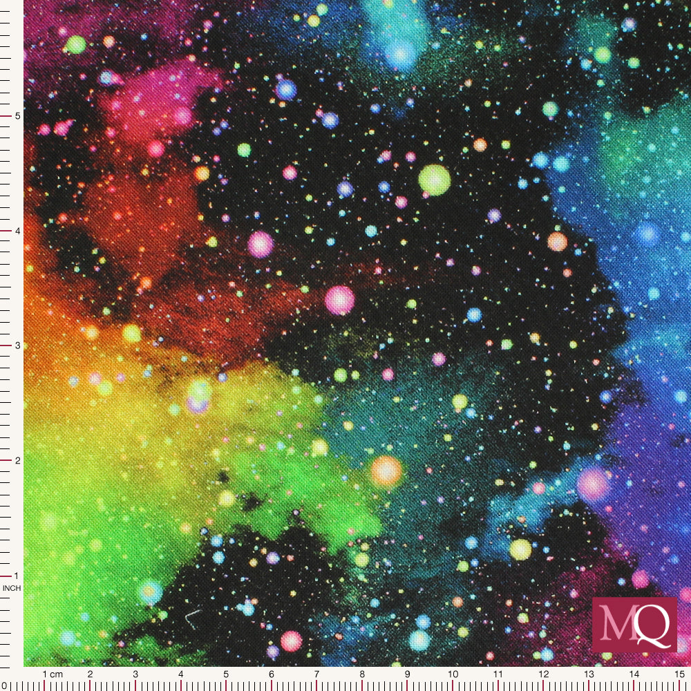 Cotton quilting fabric with galaxy space design in all colours of the rainbow