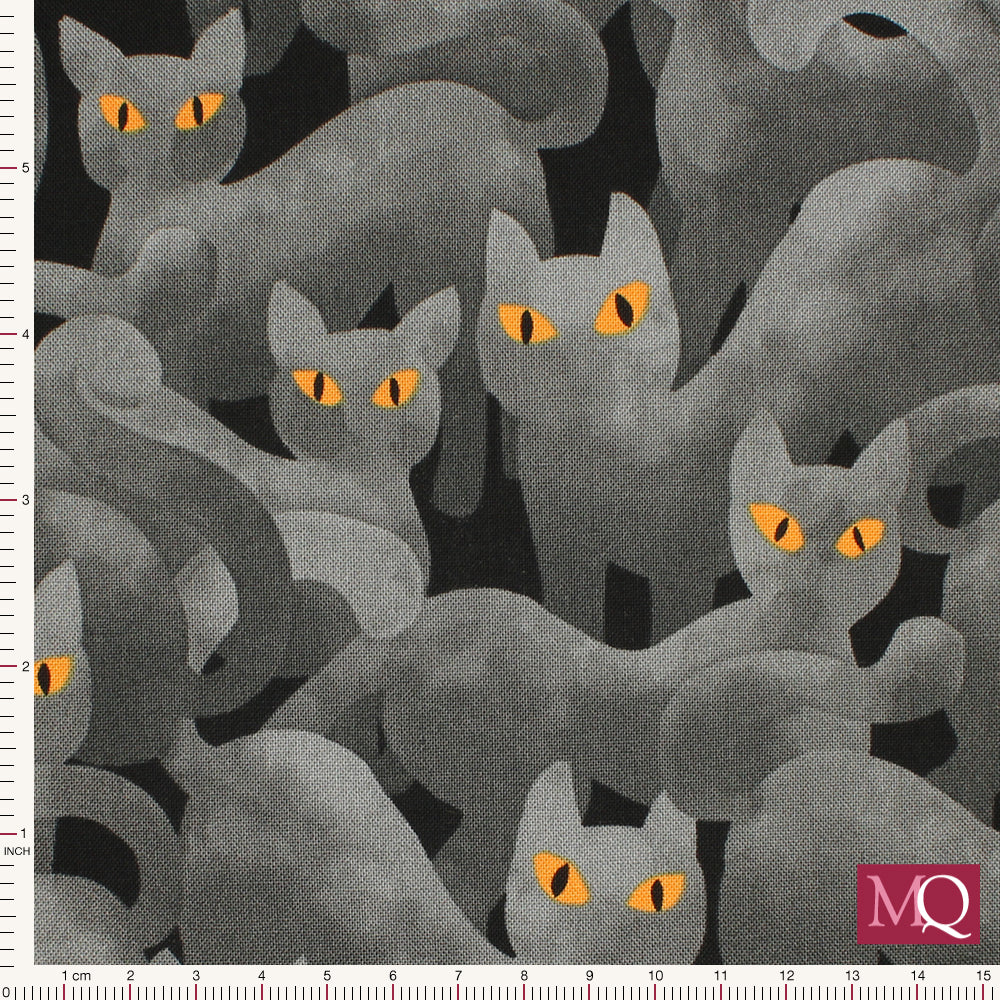 Cotton quilting fabric with shadowy grey cats with orange eyes in an allover print