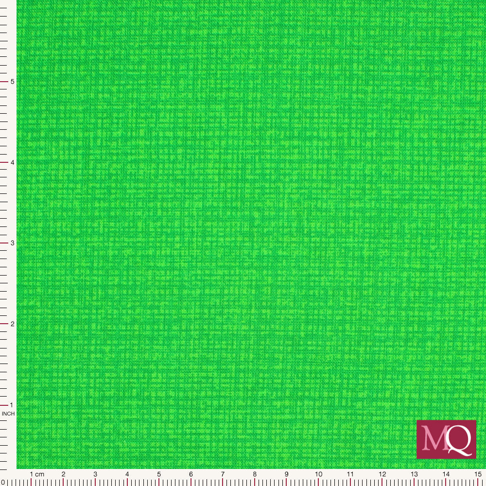 Cotton quilting fabric with tonal green woven printed texture