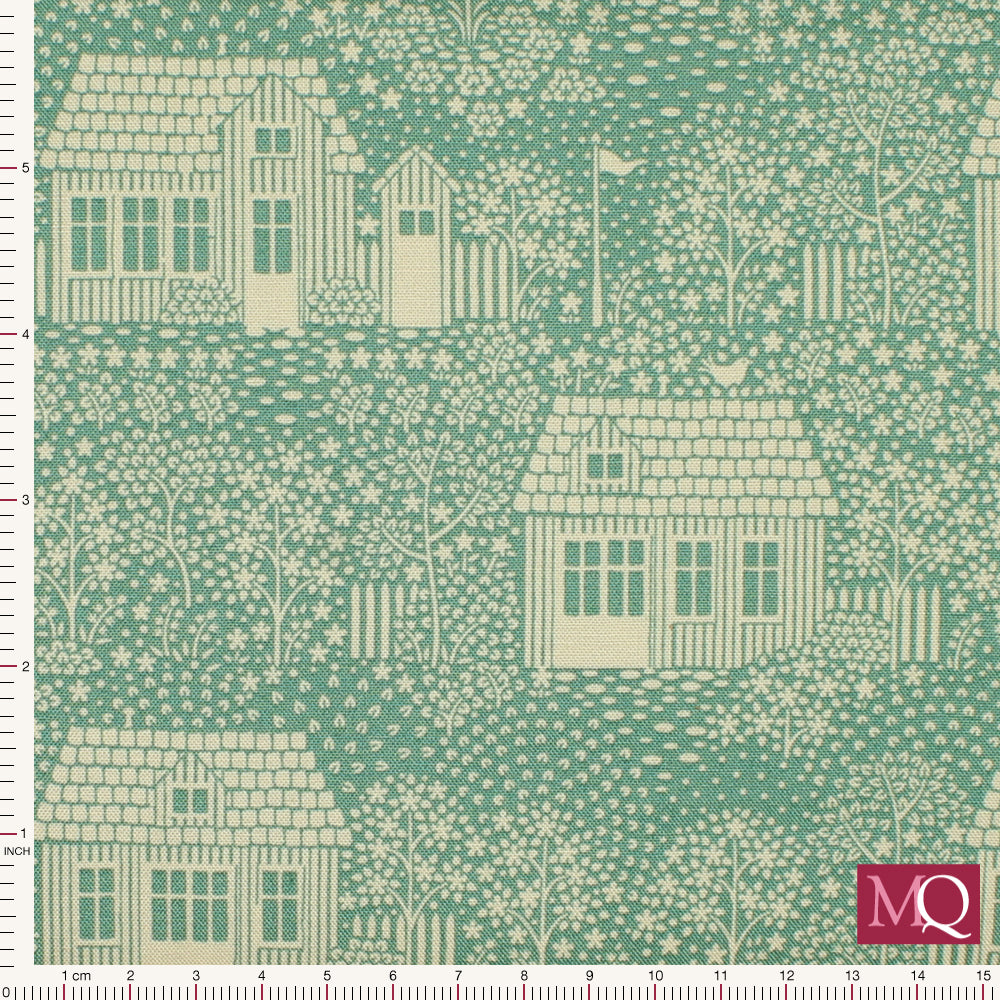Cotton quilting fabric with quaint white cottages printed on teal background