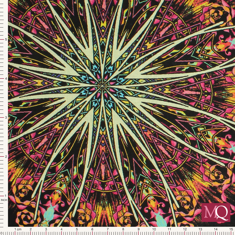 Cotton quilting fabric with kaleidoscope design in bright yellows, reds, pinks and blues on black background