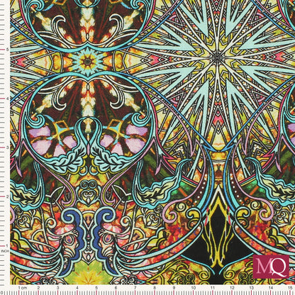 Cotton quilting fabric with kaleidoscope design in multi colours in an art nouveau style