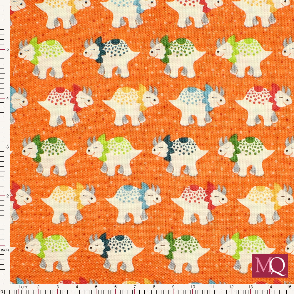 Cotton quilting fabric with all over triceratops print on orange background.