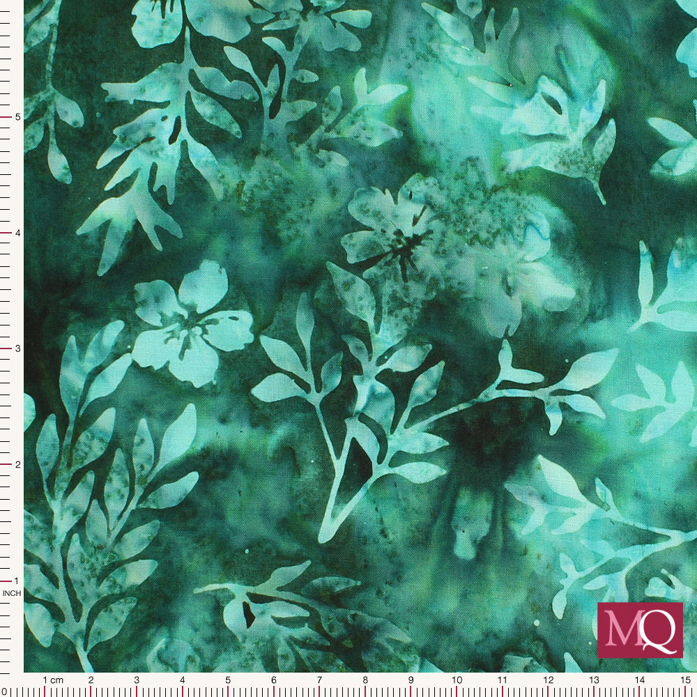 Cotton quilting fabric featuring dark green stems and flowers in a tonal batik style