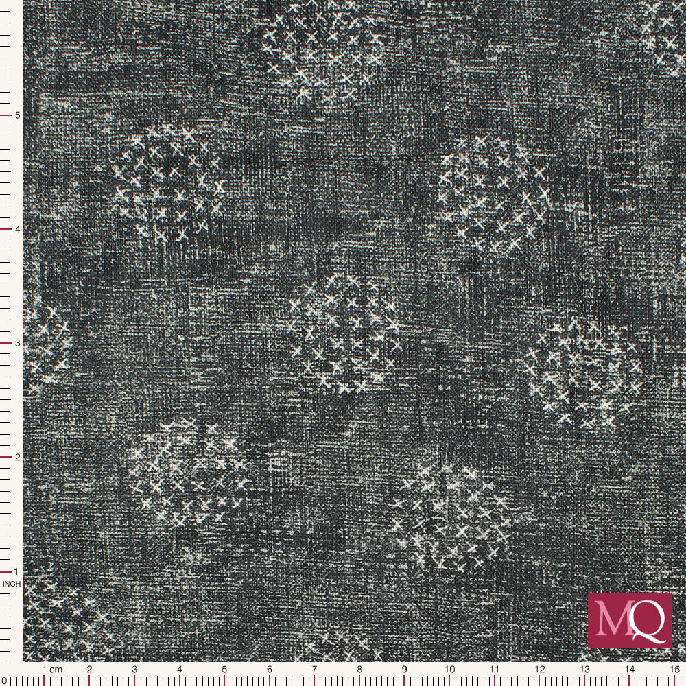Modern cotton quilt backing fabric with grey cross hatched pattern and small subtle circles