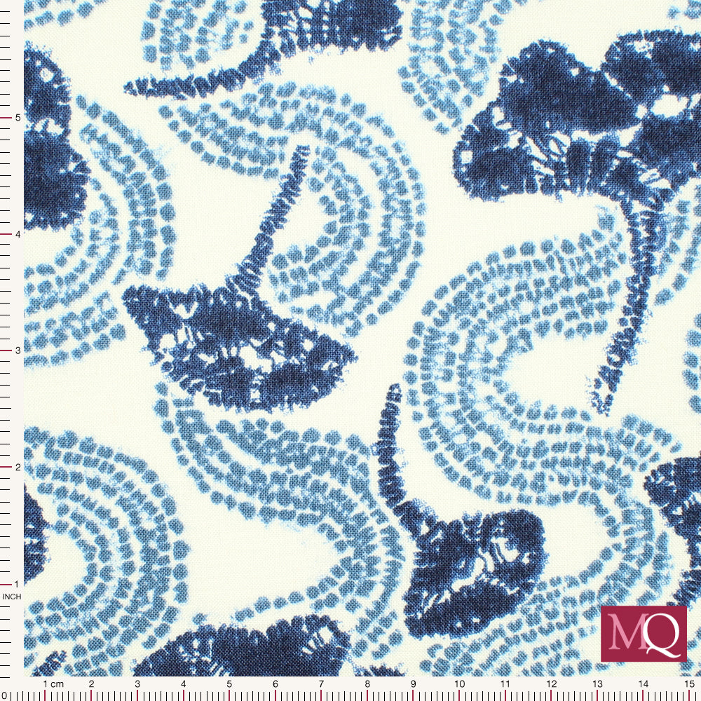 Cotton quilting fabric with tie dye effect and ginkgo leaves in tonal blues on white