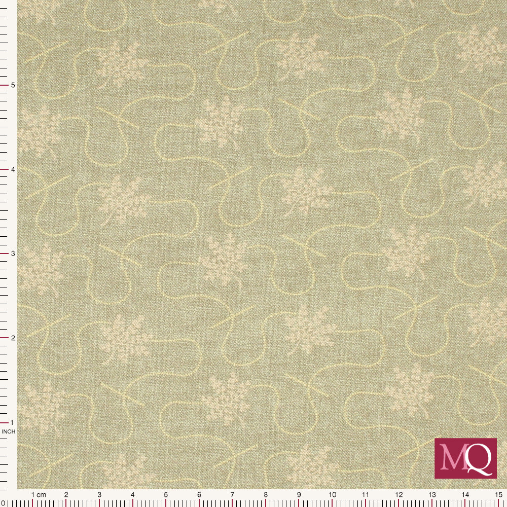 Cotton quilting fabric in muted tones with subtle tonal floral motif on beige background
