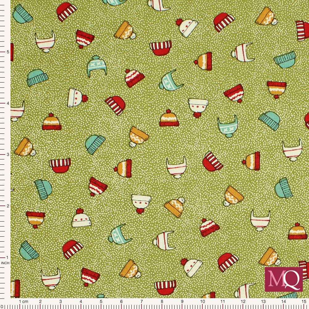 Green cotton quilting fabric with Christmas theme featuring winter hats