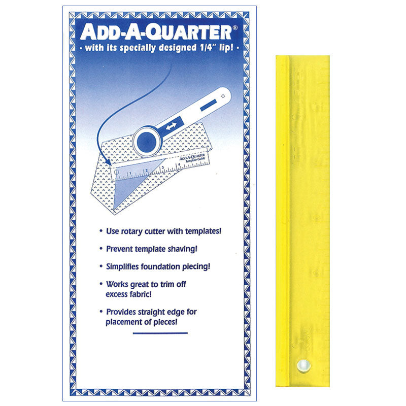 Quilting accessory transparent yellow ruler useful for cutting quilt pieces and adding a quarter inch