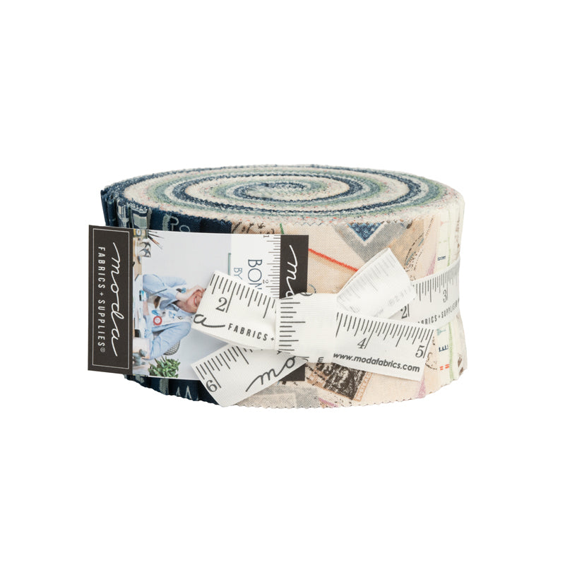 Cotton quilting fabric in handy jelly roll featuring designs in muted vintage teal tones with travel theme