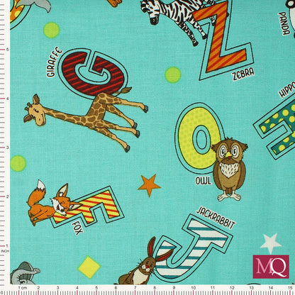 Cotton quilting fabric with alphabets and animals on turquoise