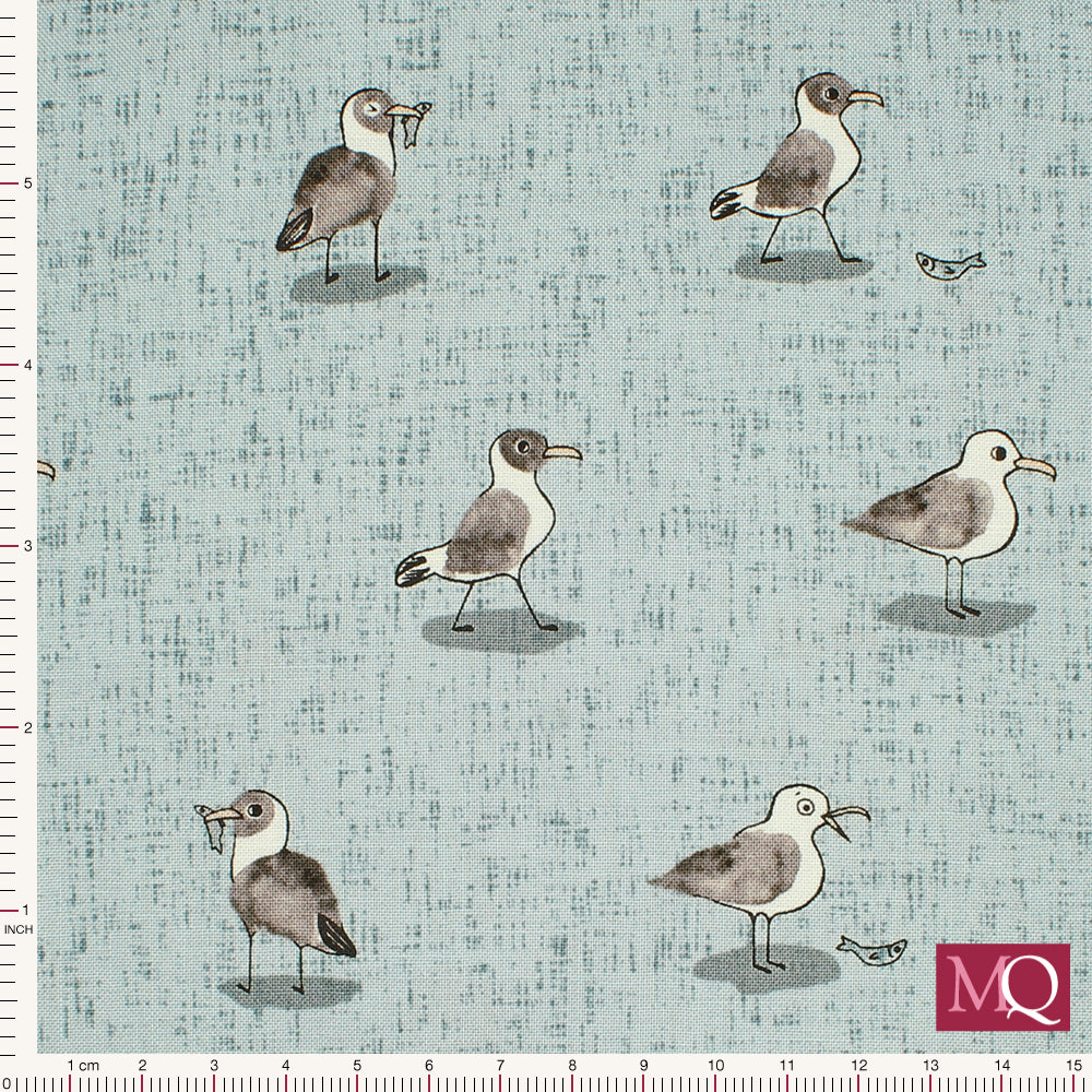 Cotton quilting fabric with modern illustrations of seagulls on a mottled warm blue background