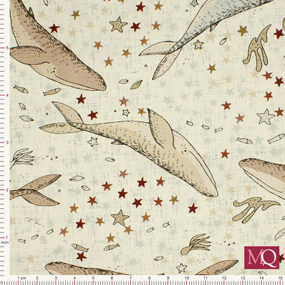 Cotton quilting fabric with tonal warm brown whales on warm cream background with starfish and fish