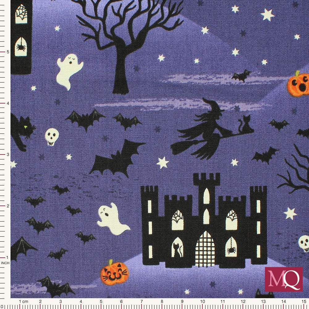 Cotton quilting fabric with halloween theme on purple background featuring cats, ghosts, pumpkins, bats and haunted houses