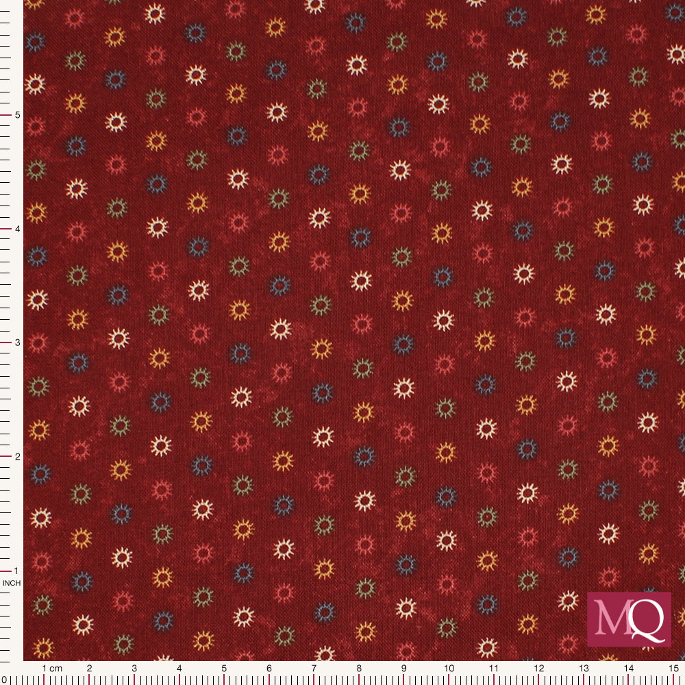 Cotton quilting fabric in barn red with small abstract dots and a traditional feel