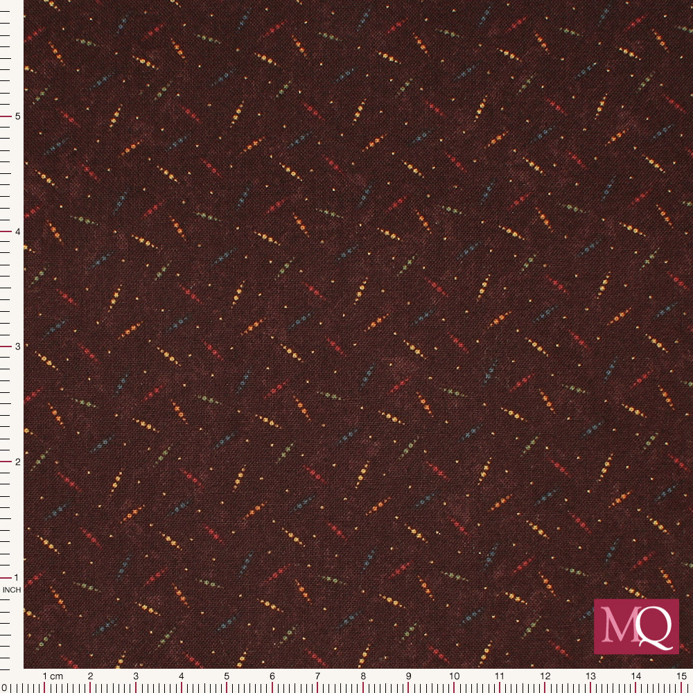 Cotton quilting fabric with dainty abstract print on a deep rusty red background with a traditional feel