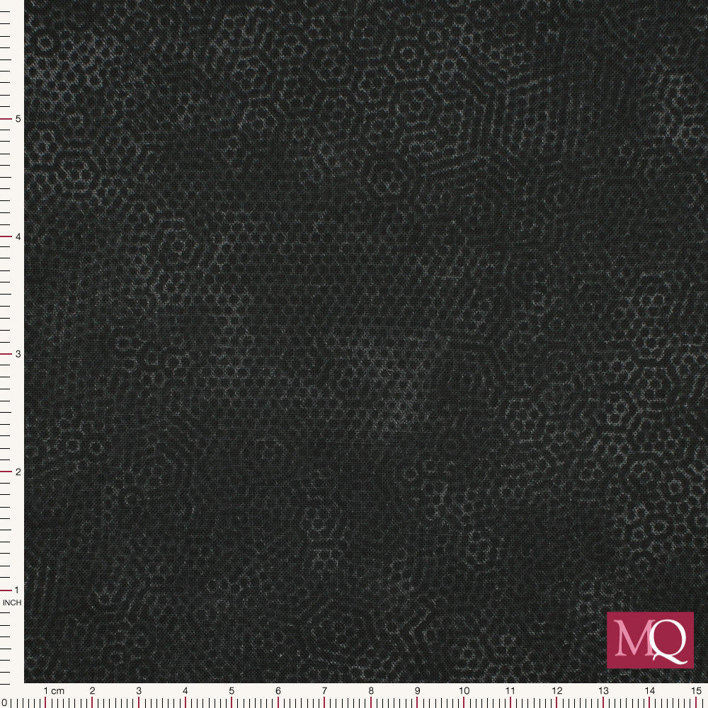 Cotton quilting fabric with tonal charcoal grey pattern of dimples in hexagon formation