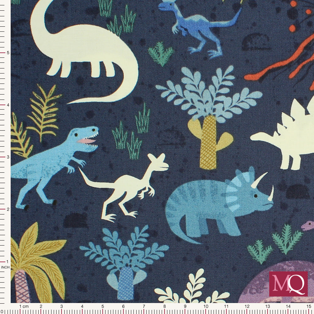 Cotton quilting fabric featuring prehistoric plants and dinosaurs including glow in the dark dinosaur silhouettes