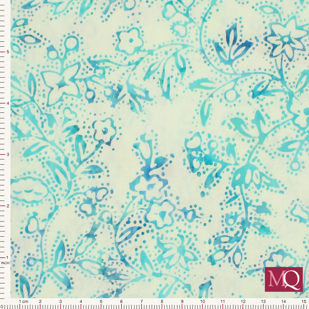 Cotton quilting fabric with blue and white batik design featuring floral stems