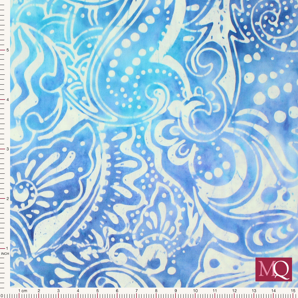 Cotton quilting fabric with dark blue batik swirls on white