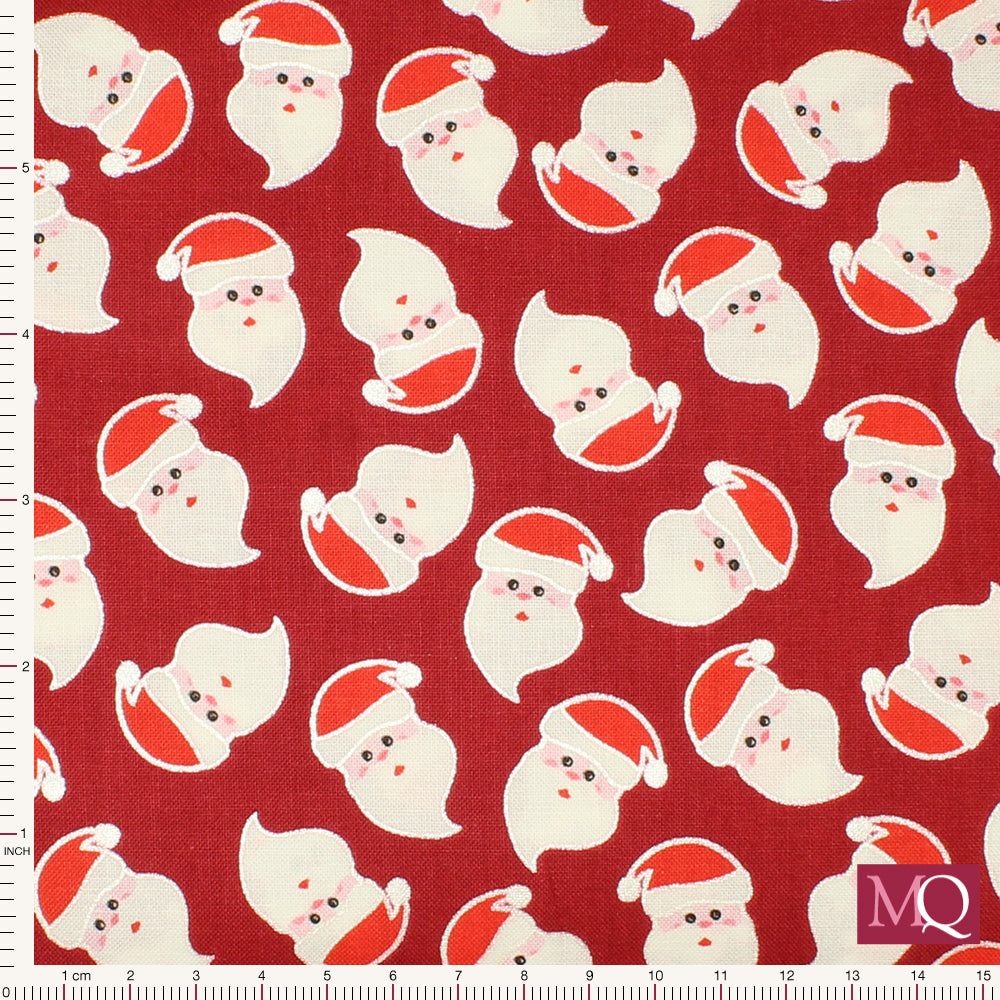 Cotton quilting fabric with all over novelty Father Christmas Santa print and silver highlight