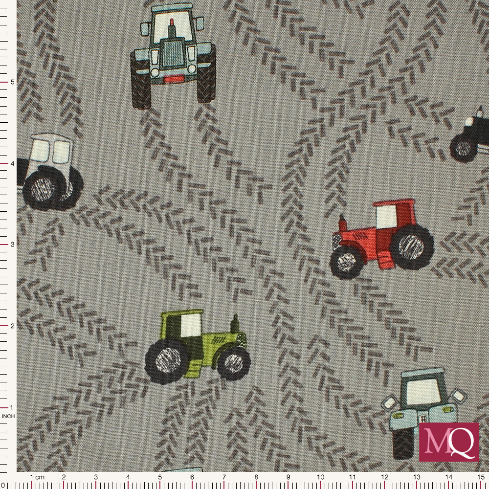 Cotton quilting fabric with tractors and tracks on grey