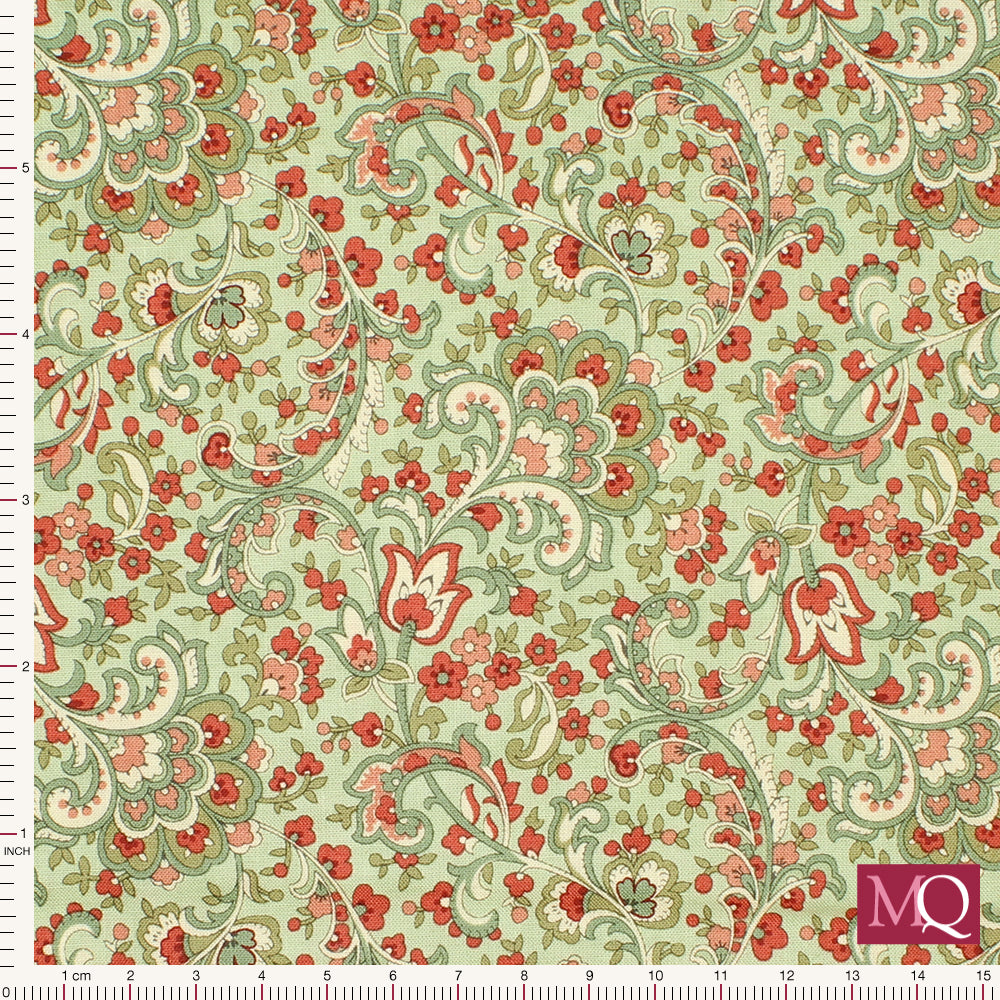 Cotton quilting fabric with floral paisley style design in red and green