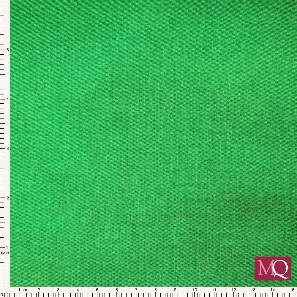 Cotton quilting fabric with painterly ombre running from lime green to deep forest green