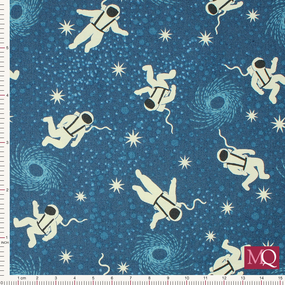 Cotton quilting fabric with modern glow in the dark astronauts on a space background.