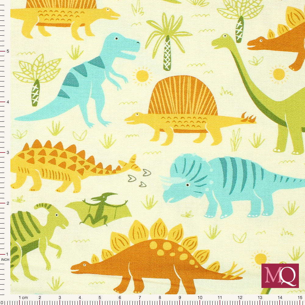 Cotton quilting fabric featuring cartoon dinosaurs in modern muted tones