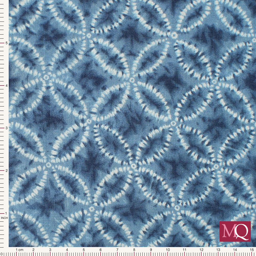 Cotton quilting fabric in light indigo with classic Japanese Shibori geometric print