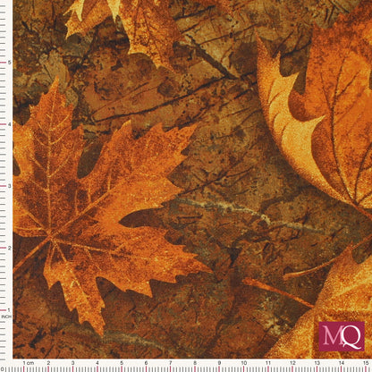 Cotton quilting fabric with autumnal leaves in warm brown tones