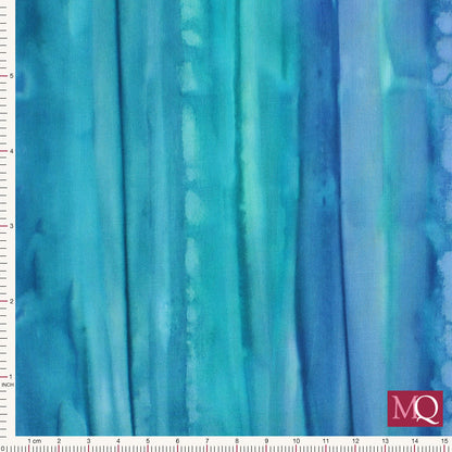 Cotton quilting fabric with tie dye effect in blue stripes