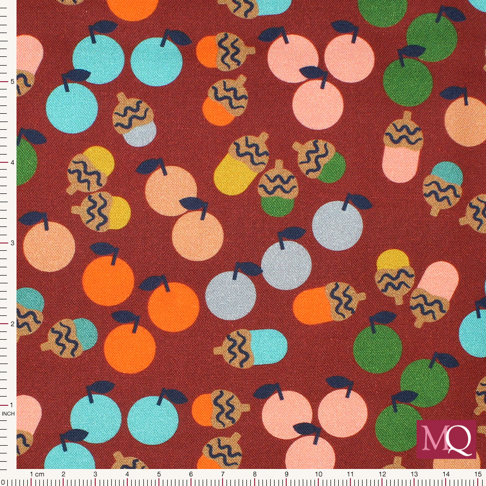 Cotton quilting fabric with modern fruit and acorns in warm tones on a burnt red background